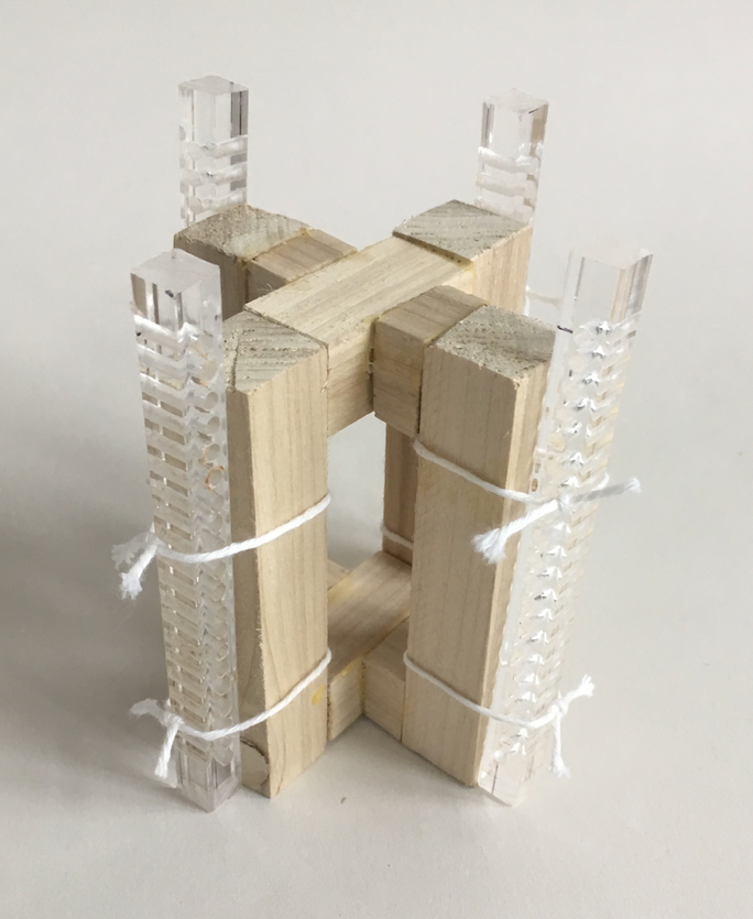 Coil spacers with wooden frame